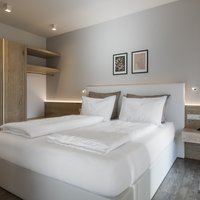 Apartment Vigilius: bedroom with double bed